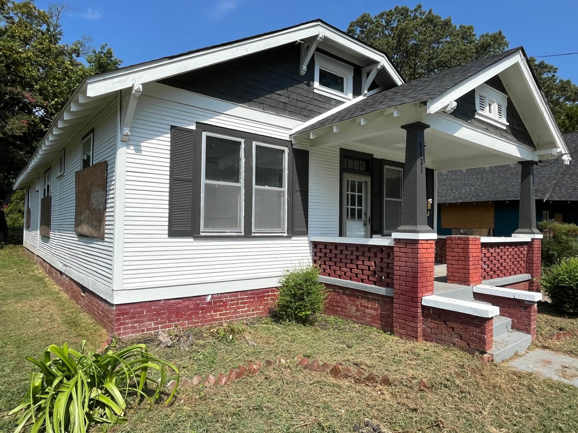 1131 Rozelle Street Memphis, TN 38106 - Photo 2 of 19 a view of a house with a yard and sitting area