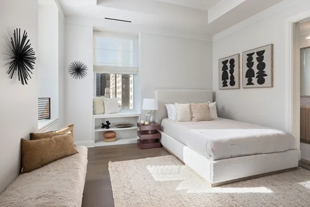 a bathroom with a double vanity sink toilet a shower and a bathtub