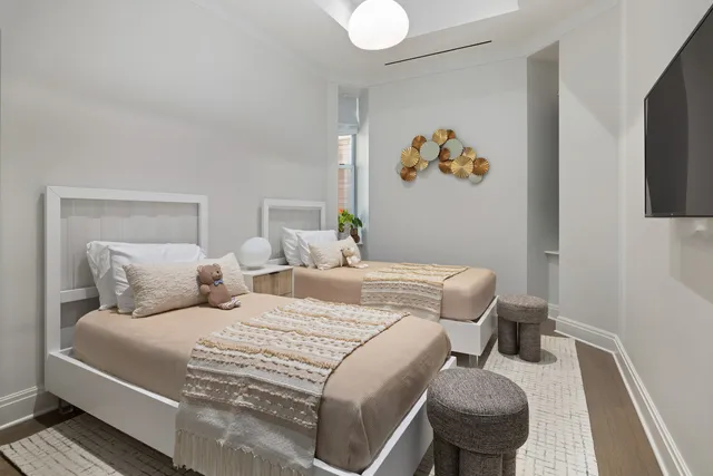 a bedroom with a bed and furniture