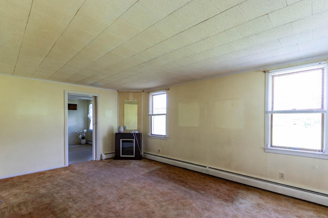203 Gorton Road Moshannon, PA 16859 - Photo 8 of 39 an empty room with windows and closet