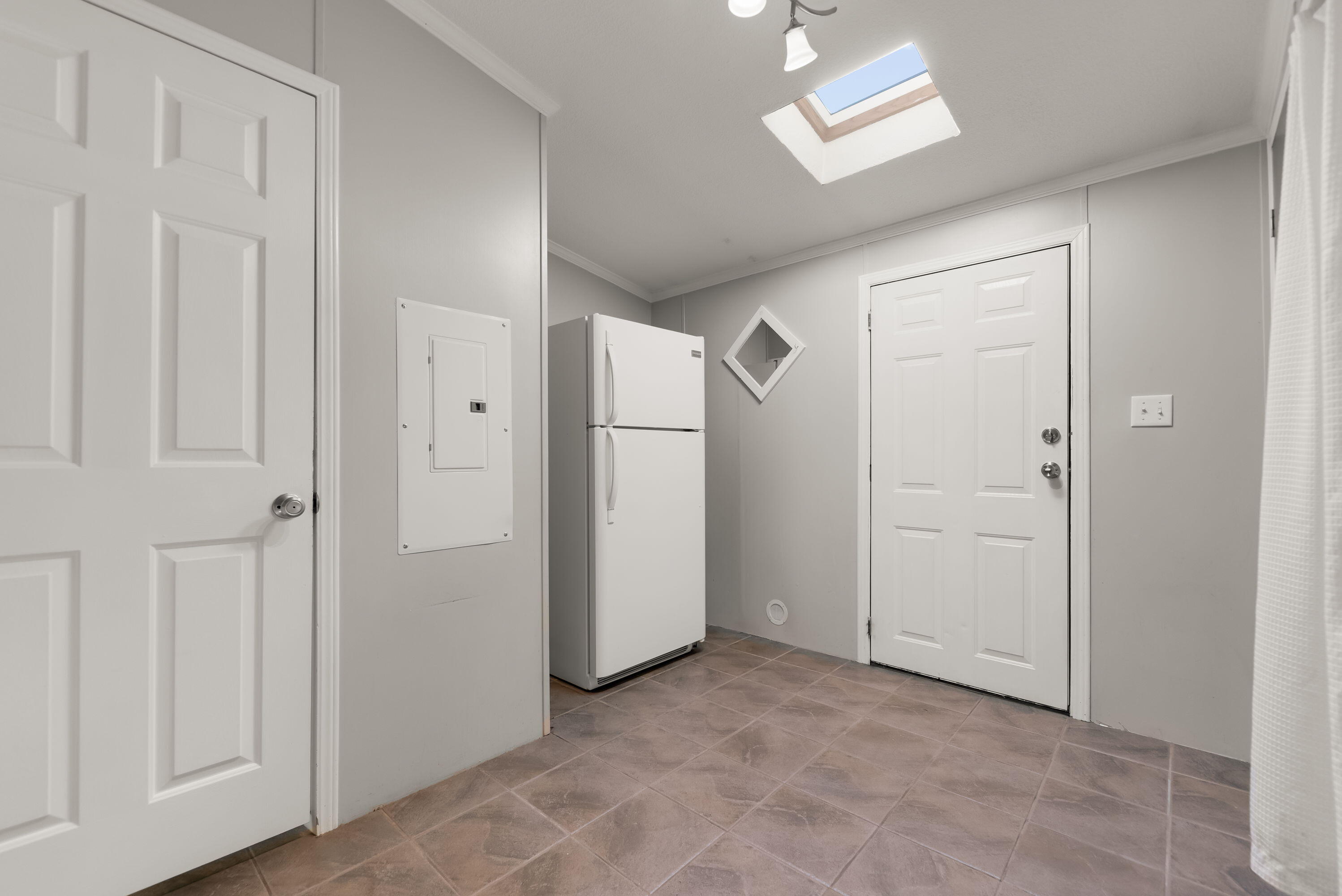 4678 West Schultz Road La Porte, IN 46350 - Photo 11 of 26 an empty room with windows and closet