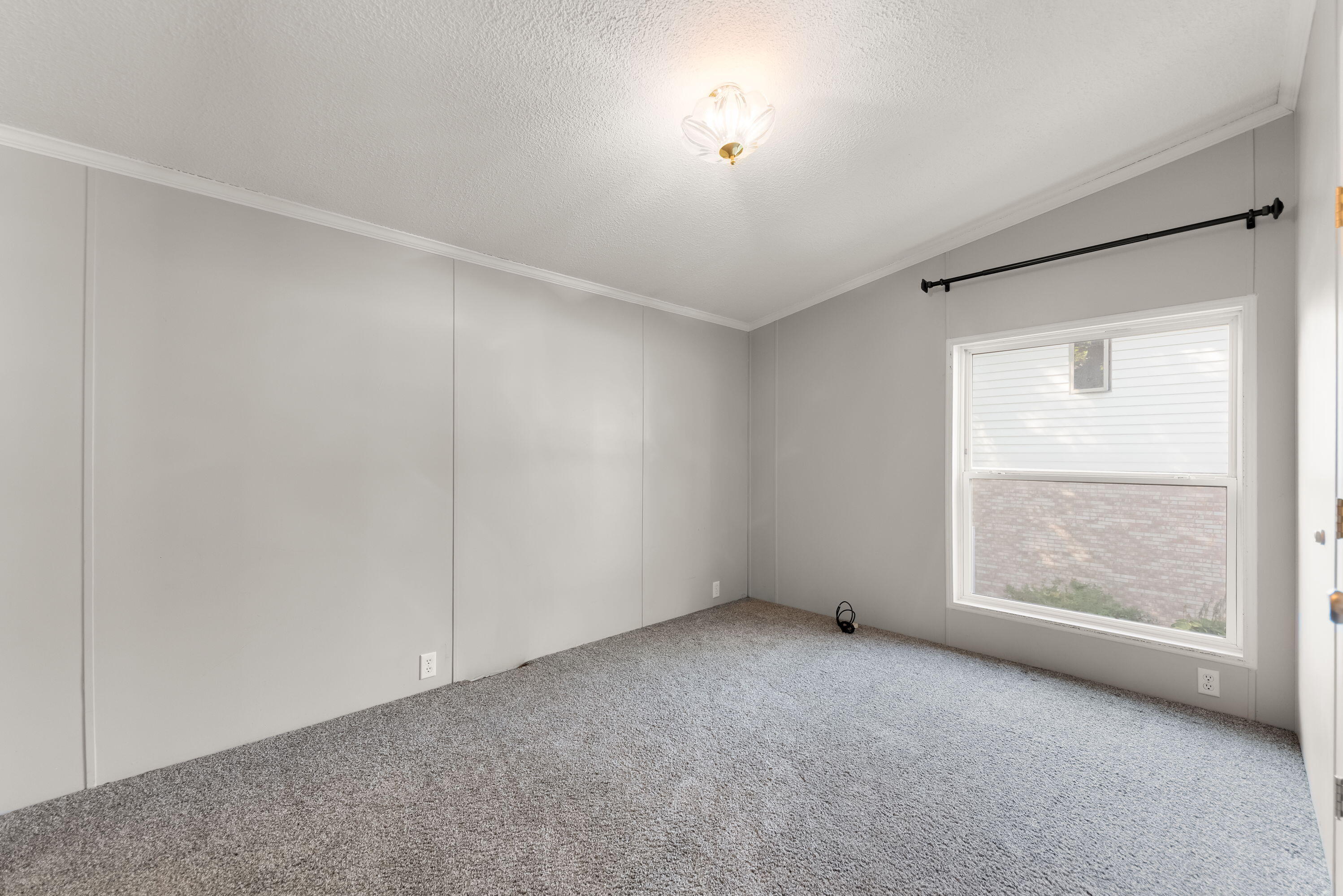 4678 West Schultz Road La Porte, IN 46350 - Photo 18 of 26 an empty room with a empty space and windows