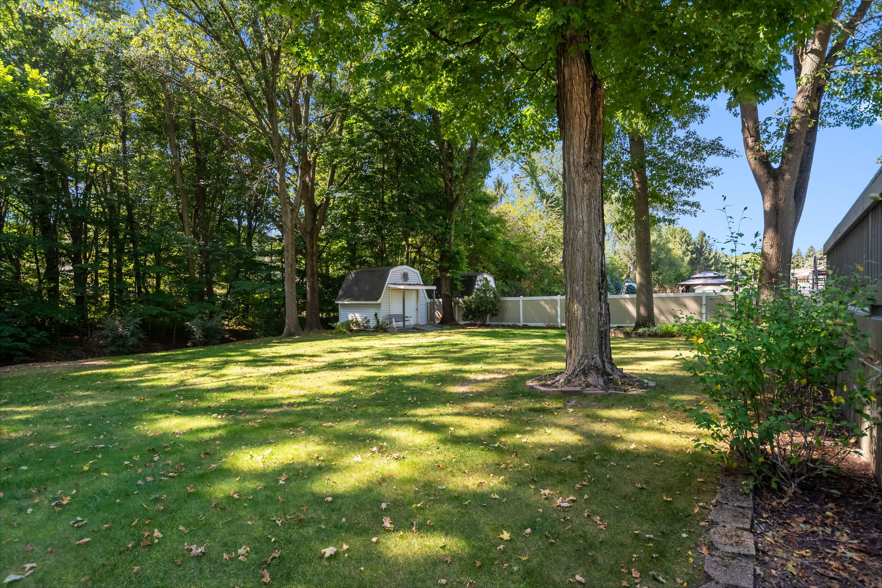 4678 West Schultz Road La Porte, IN 46350 - Photo 22 of 26 a swimming pool with trees in the background