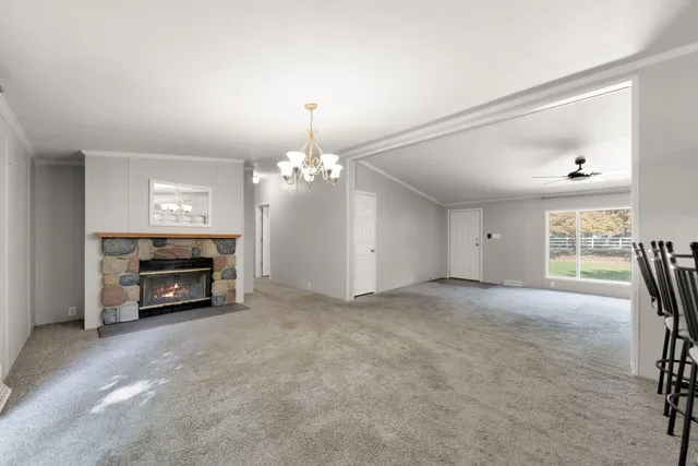 a view of livingroom with furniture and fireplace