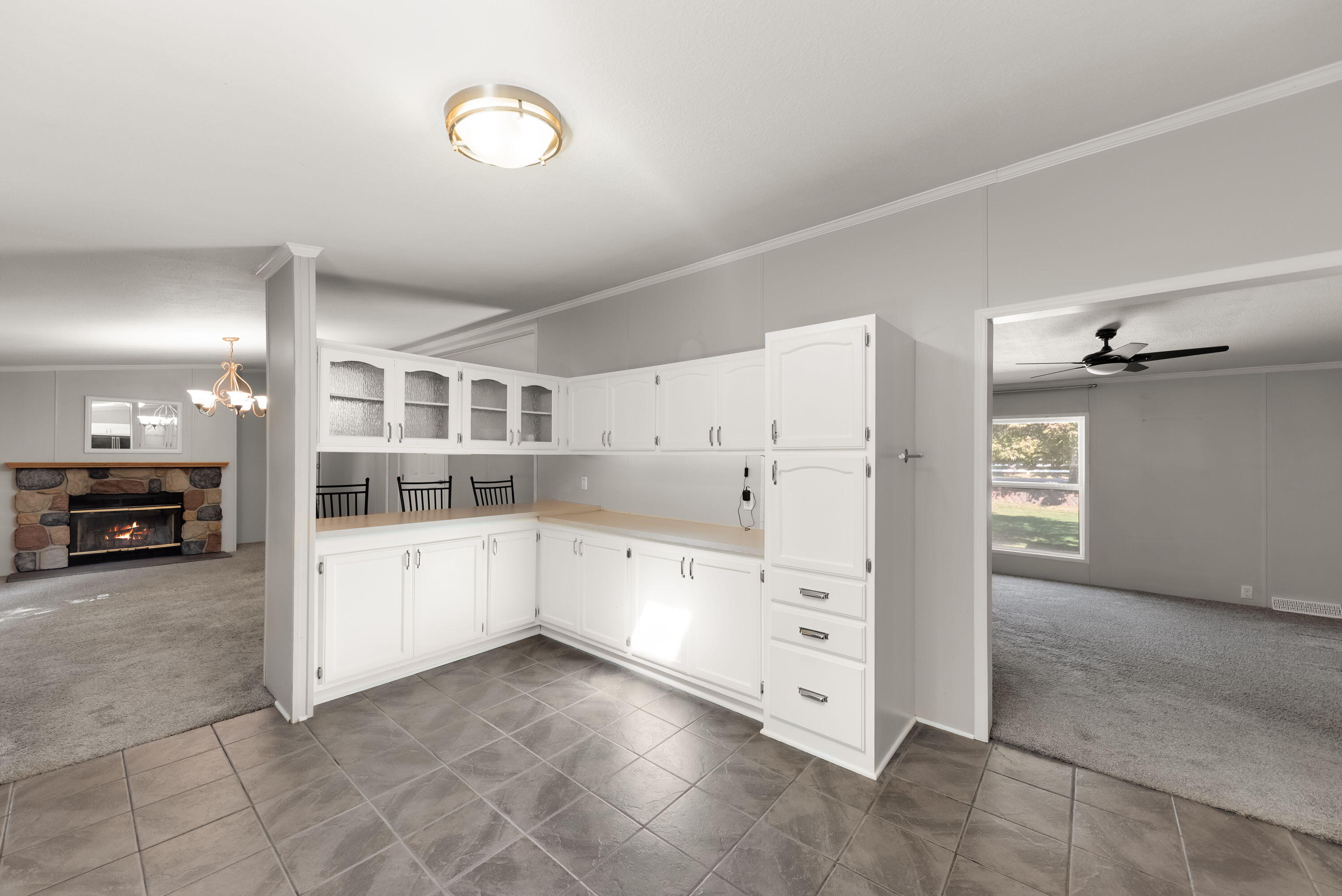 4678 West Schultz Road La Porte, IN 46350 - Photo 6 of 26 a view of a kitchen with furniture and cabinets