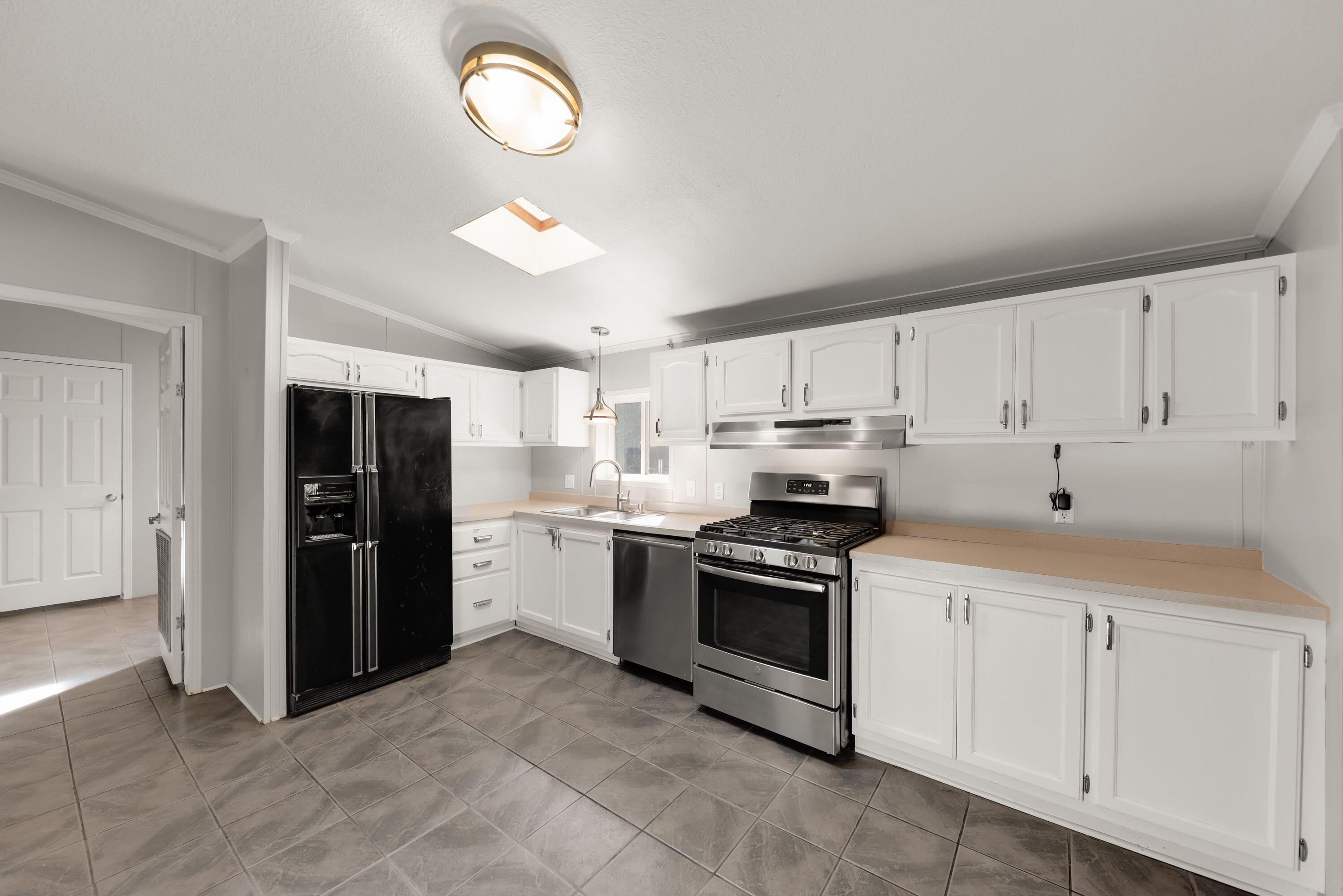 4678 West Schultz Road La Porte, IN 46350 - Photo 8 of 26 a kitchen with cabinets and steel stainless steel appliances