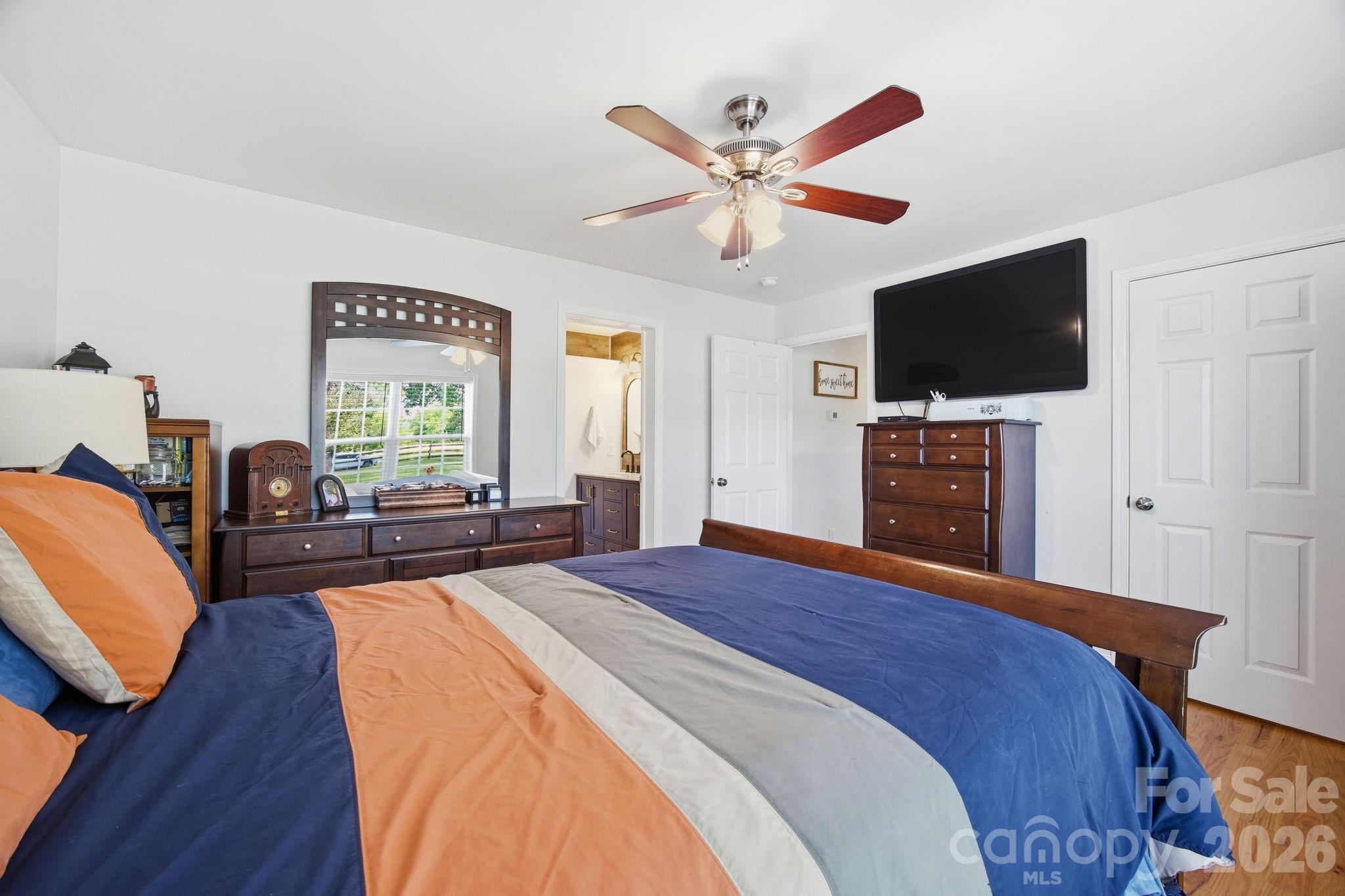3480 Skyline Road Rock Hill, SC 29730 - Photo 17 of 40 a bedroom with a bed and a flat screen tv