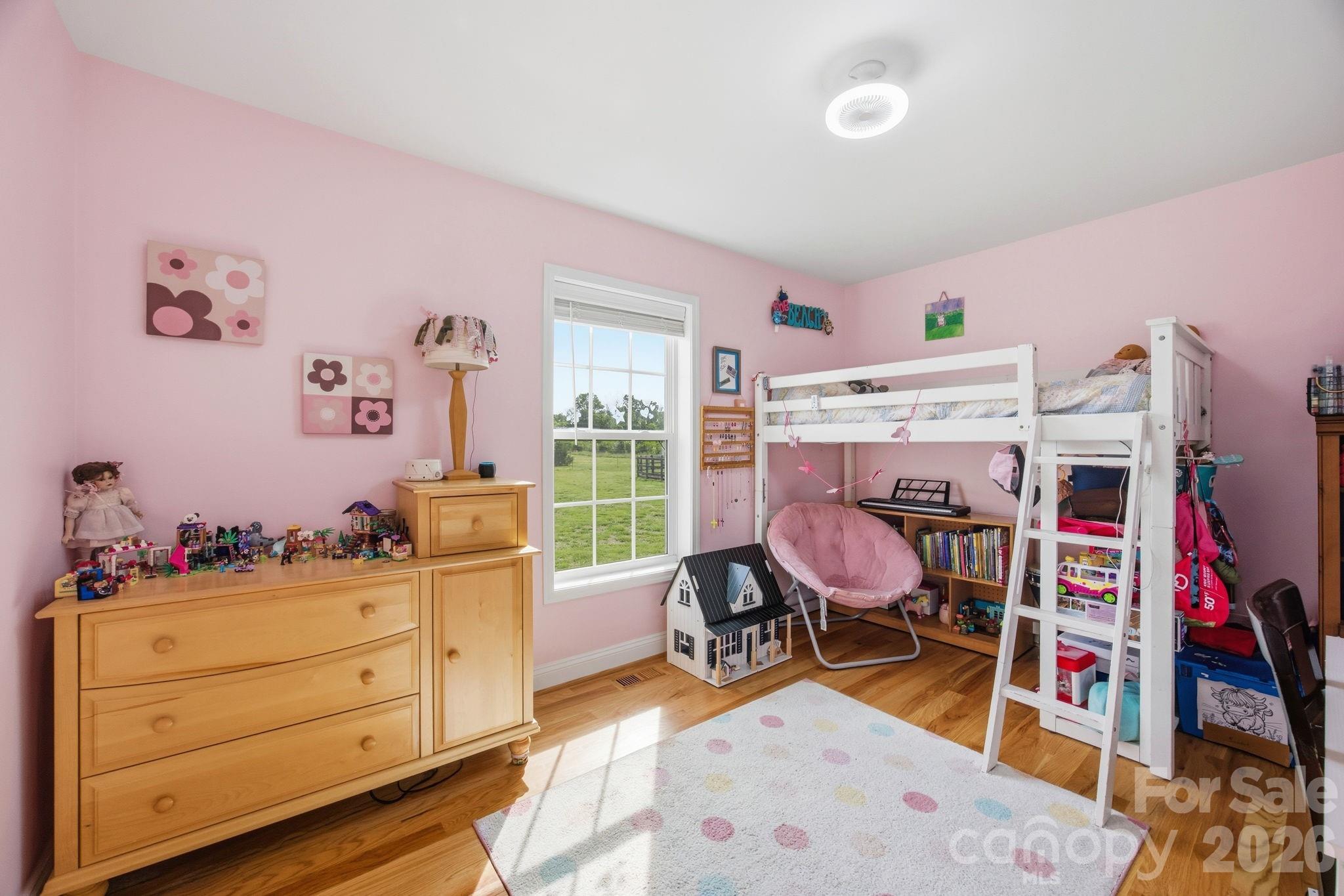 3480 Skyline Road Rock Hill, SC 29730 - Photo 19 of 40 a bed room with a bed and a chair