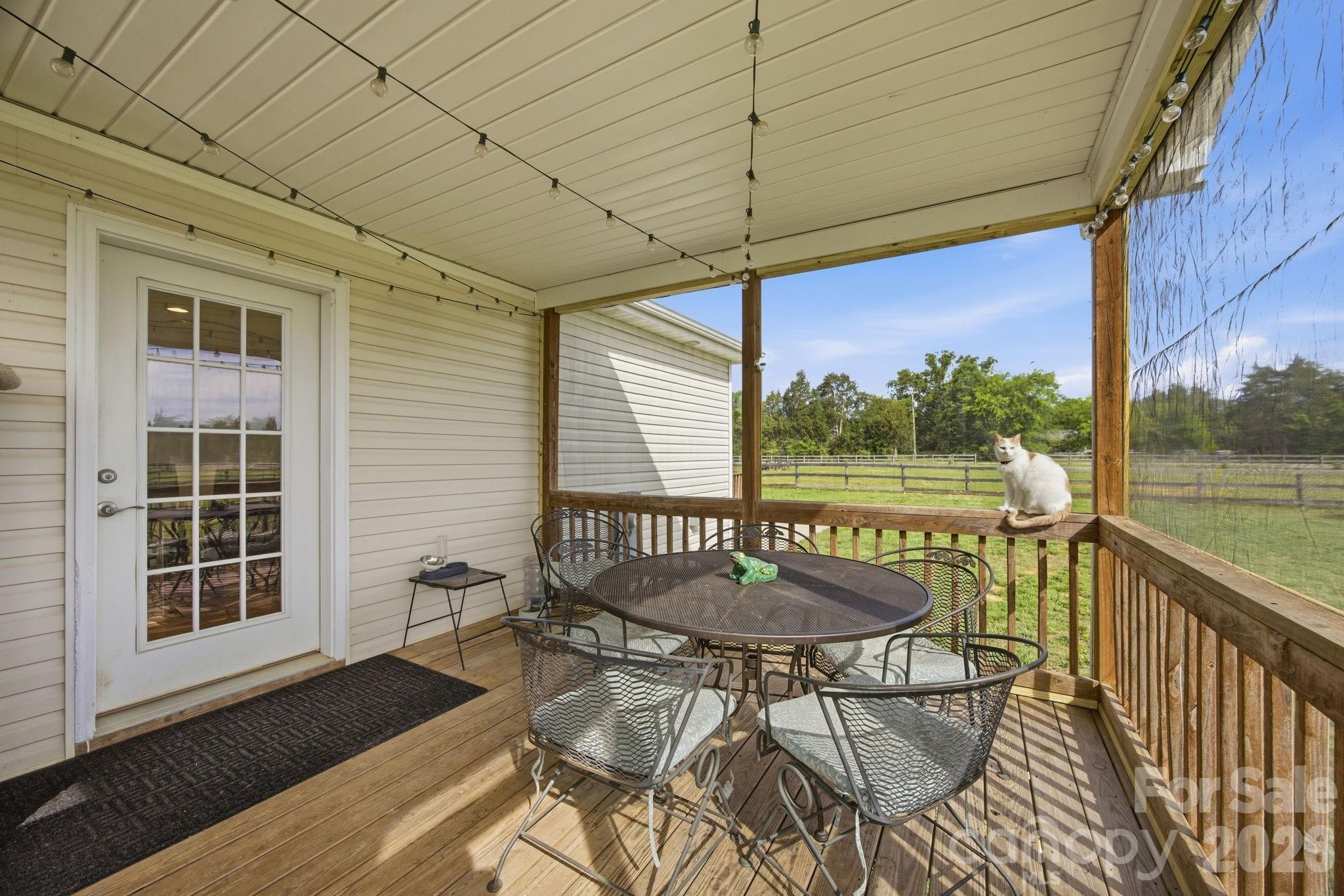 3480 Skyline Road Rock Hill, SC 29730 - Photo 26 of 40 a view of a patio with a table chairs and a table