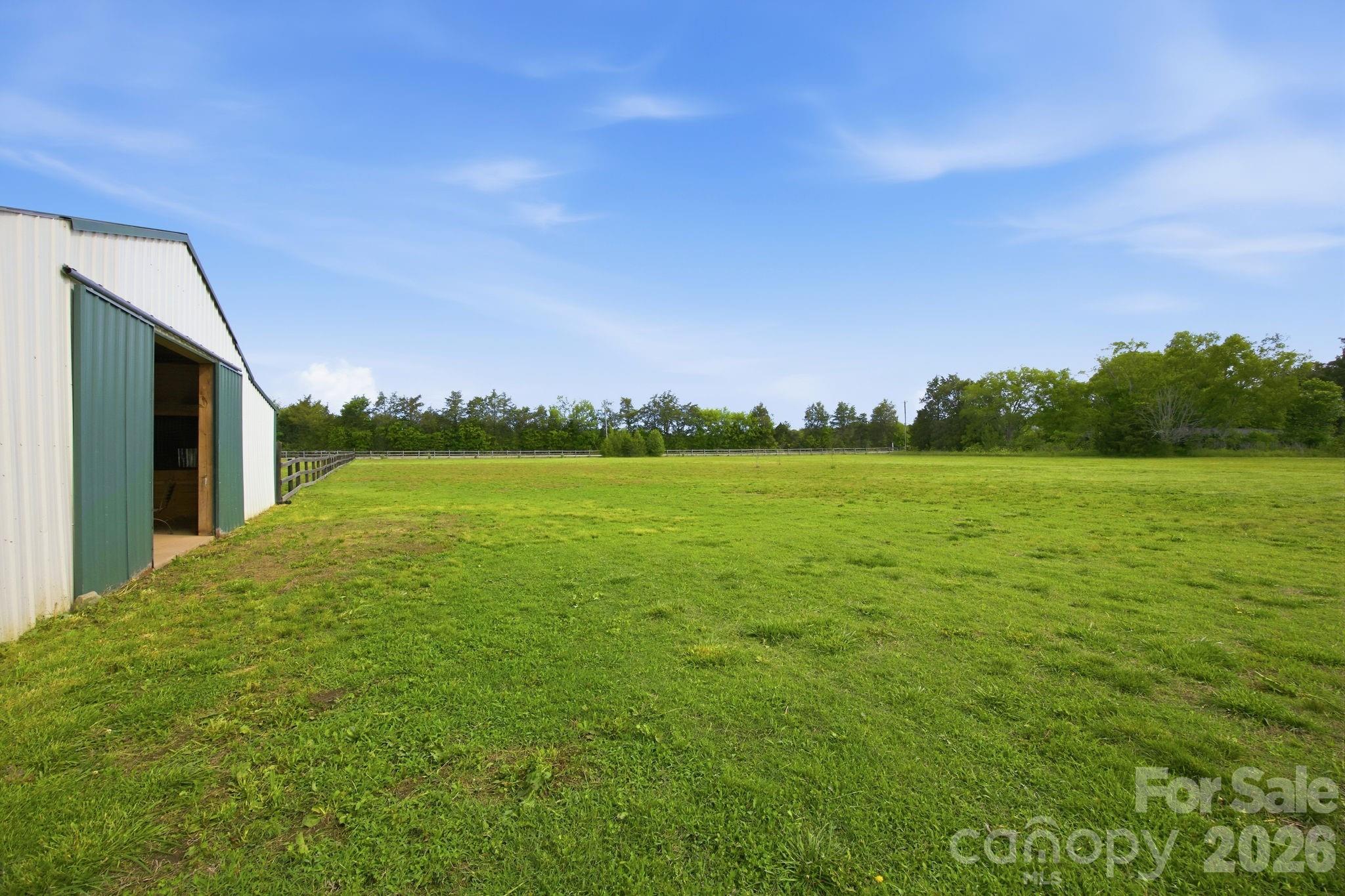 3480 Skyline Road Rock Hill, SC 29730 - Photo 32 of 40 a view of a big yard with a house in the background