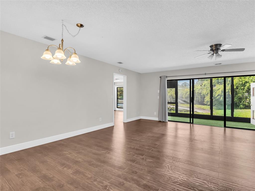 1801 East Lake Road South, Unit 20C Palm Harbor, FL 34685 - Photo 20 of 56 a view of an empty room with a window