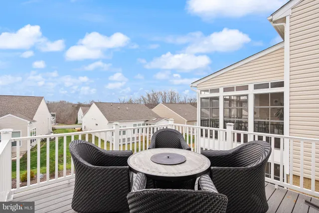 a bathroom with a tub and a sink