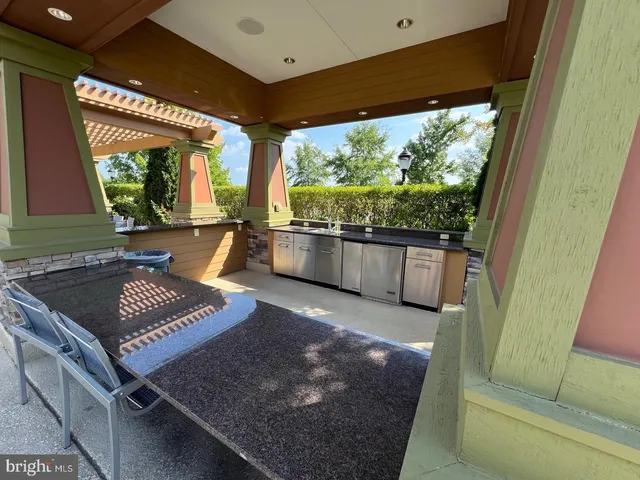 a picture of a bathroom with a shower