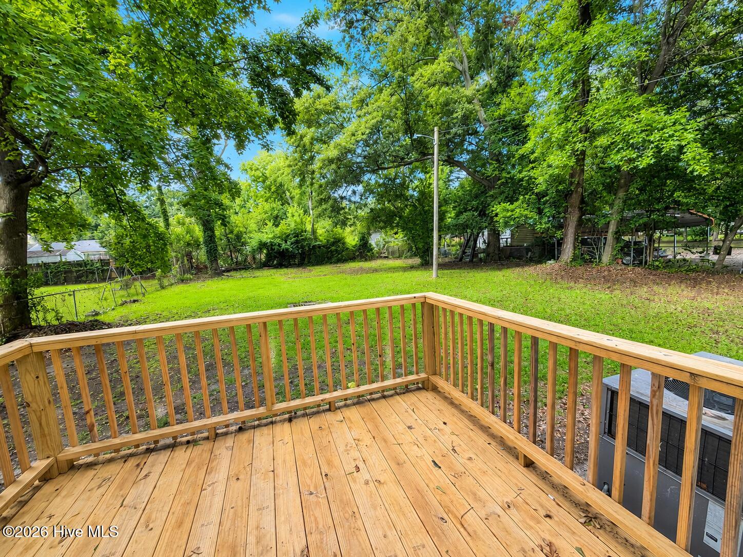 2010 Virginia Avenue Augusta, GA 30906 - Photo 36 of 37 23_sunny_backyard_deck_with_greenery