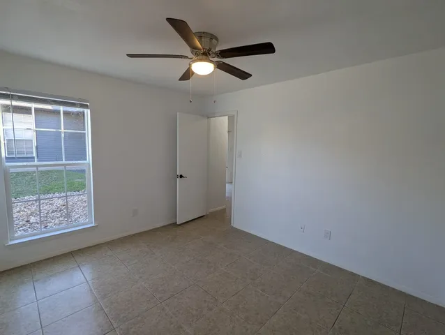 en empty room with windows