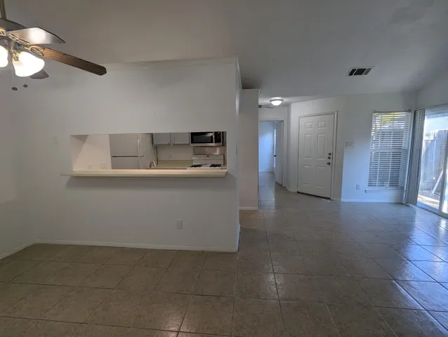 a view of a kitchen with a sink