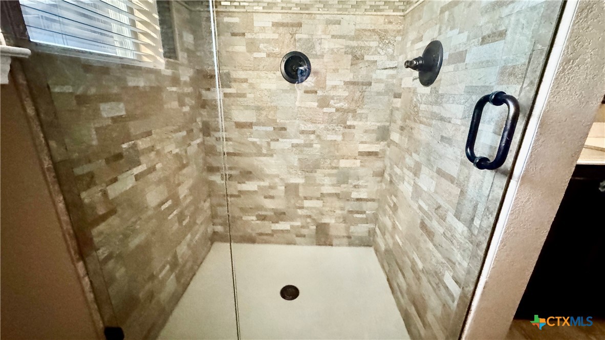 5502 Golden Drive Killeen, TX 76542 - Photo 20 of 32 a bathroom with a shower