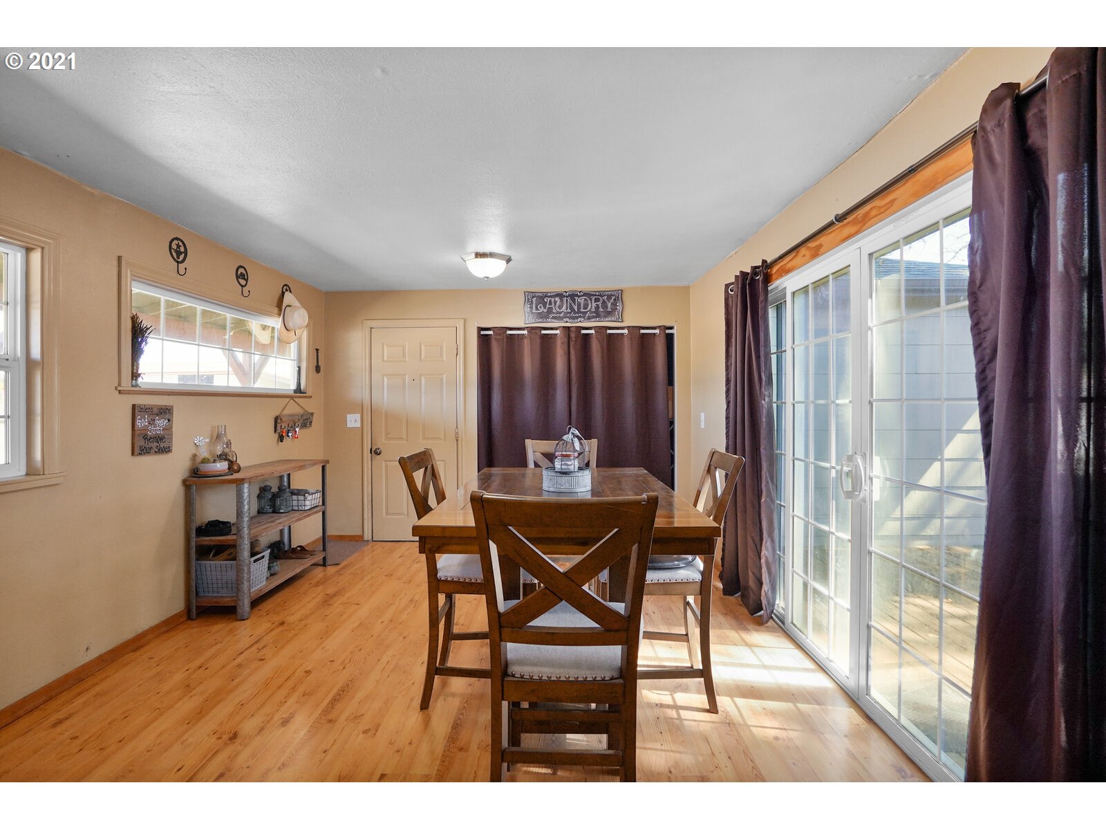 9310 Harmony Road Sheridan, OR 97378 - Photo 19 of 32 a view of a dining room with furniture and a window