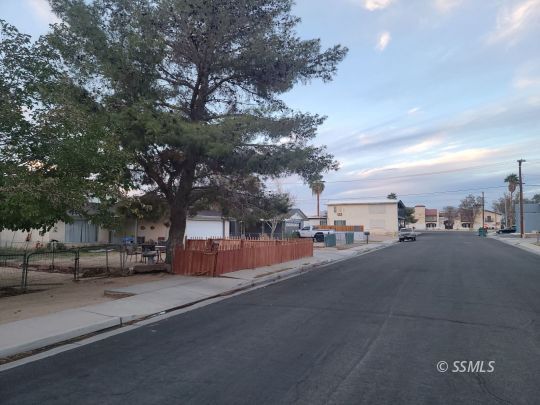 125 South Fire Opal Street Ridgecrest, CA 93555 - Photo 4 of 9 a city street lined with tall buildings