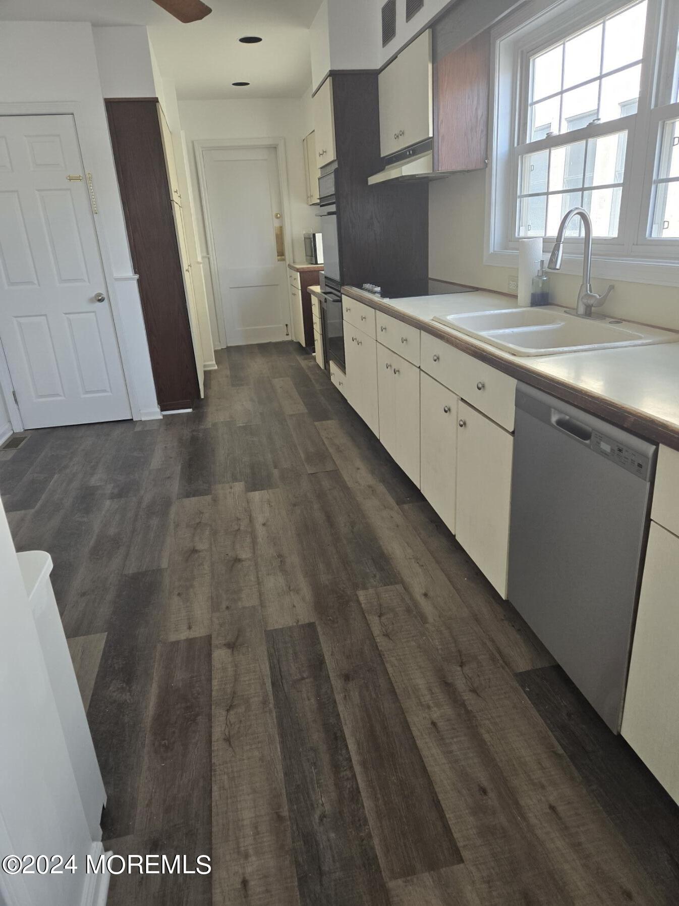 33 Reckless Place, Unit 1 Red Bank, NJ 07701 - Photo 2 of 12 Kitchen with new floors
