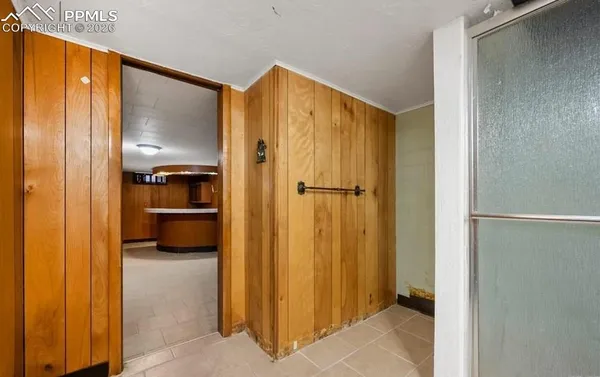 a view of a hallway with a living room