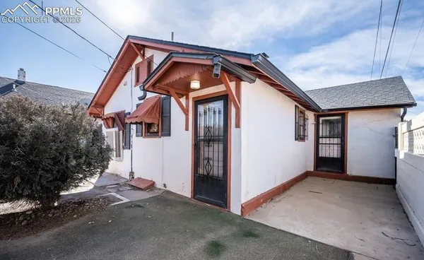 a front view of a house with a garage