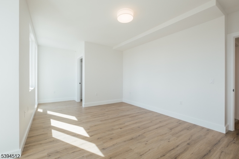 67 Dr Martin Luther King Jr Boulevard, Unit 204 Newark, NJ 07104 - Photo 23 of 27 a view of an empty room