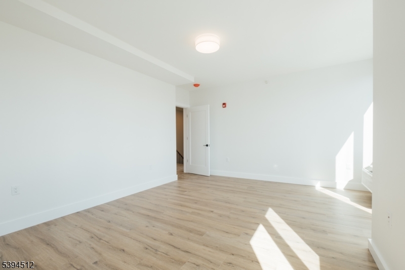 67 Dr Martin Luther King Jr Boulevard, Unit 204 Newark, NJ 07104 - Photo 25 of 27 a view of an empty room