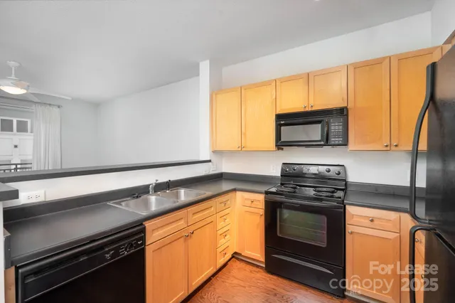 a white refrigerator freezer sitting in a kitchen