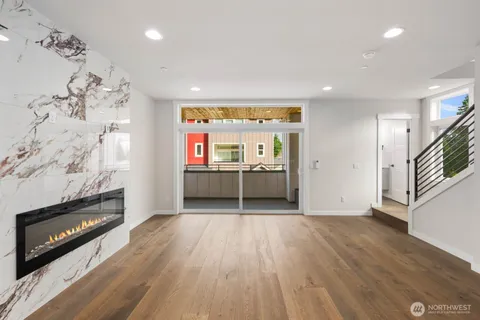 a bathroom with a sink and mirror with toilet