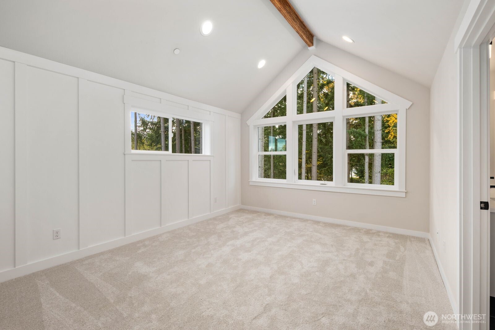 19722 Filbert Drive, Unit 10 Bothell, WA 98012 - Photo 28 of 33 an empty room with windows