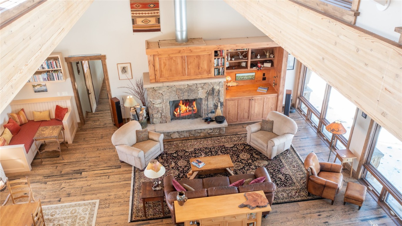 742 Lumberjack Road Fairplay, CO 80440 - Photo 14 of 35 a living room with furniture and a fireplace