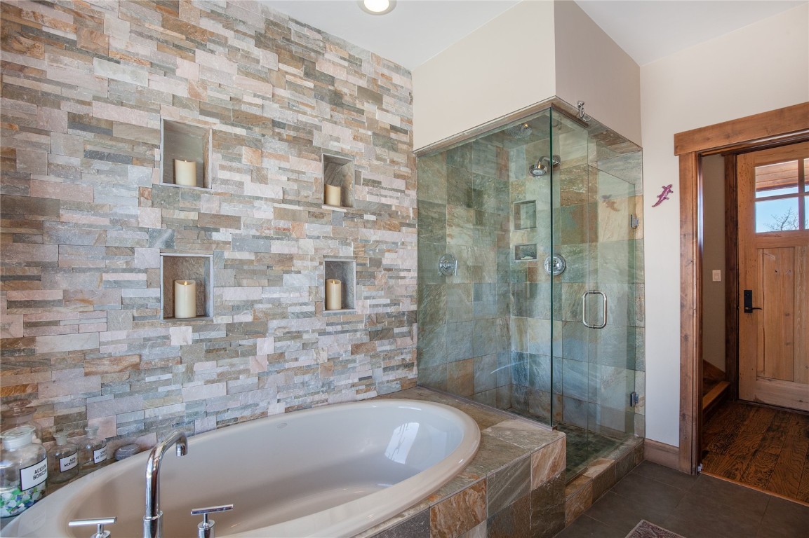 742 Lumberjack Road Fairplay, CO 80440 - Photo 18 of 35 a bathroom with a bathtub and shower