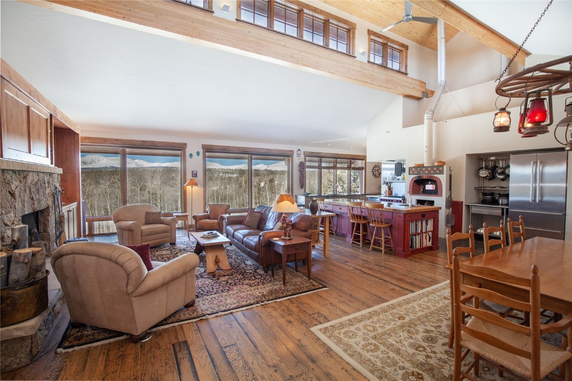 742 Lumberjack Road Fairplay, CO 80440 - Photo 8 of 35 a living room with furniture and a fireplace