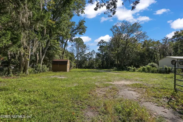 a fire hydrant in the middle of a field