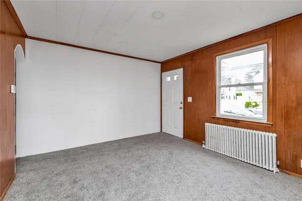 an empty room with window