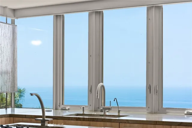 a view of a living room with a large window