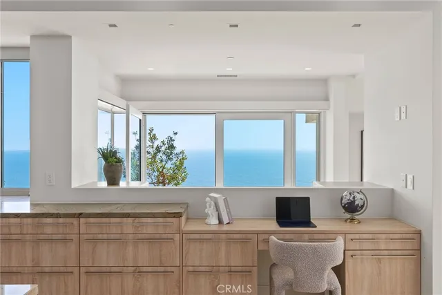 a spacious bathroom with a tub shower and mirror