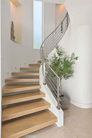 swimming pool view with a seating space