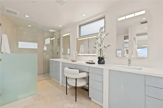 a bedroom with a bed and a table