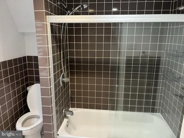 a view of a bathroom with a toilet