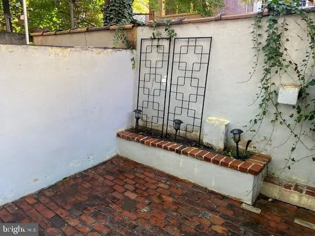 a view of a house with a street