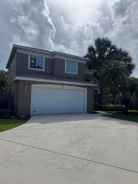 2420 Southeast Springtree Place Stuart, FL 34997 - Photo 1 of 18 a view of house with outdoor space and shower