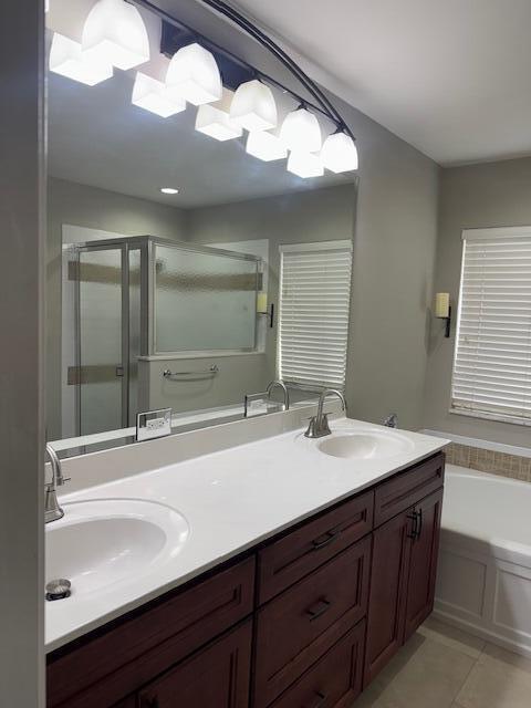 2420 Southeast Springtree Place Stuart, FL 34997 - Photo 12 of 18 a bathroom with a sink and a mirror