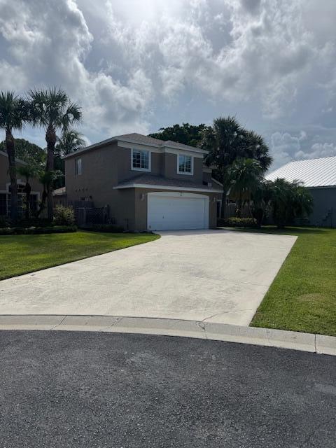 2420 Southeast Springtree Place Stuart, FL 34997 - Photo 2 of 18 a view of swimming pool with a yard