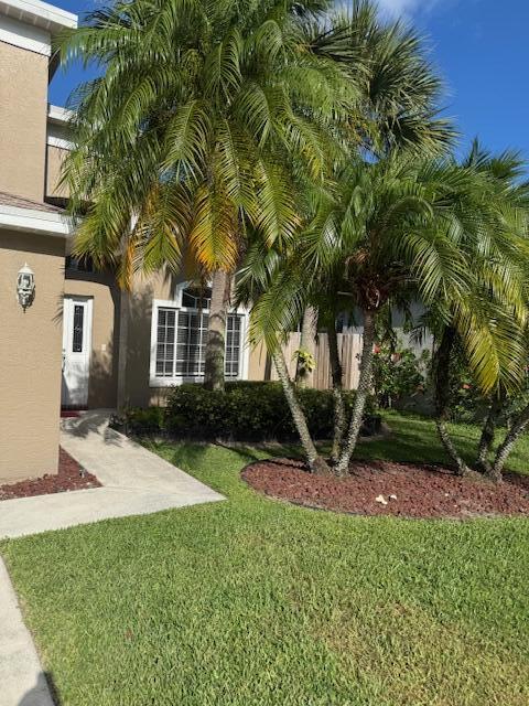 2420 Southeast Springtree Place Stuart, FL 34997 - Photo 3 of 18 a view of outdoor space yard and porch