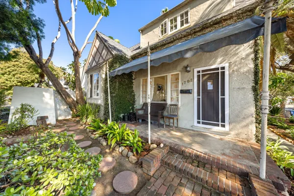 a view of a chair and table in a patio