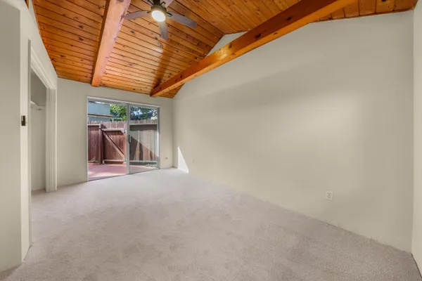 a view of empty room with closet