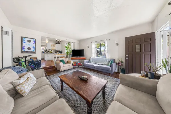a living room with furniture and a couch