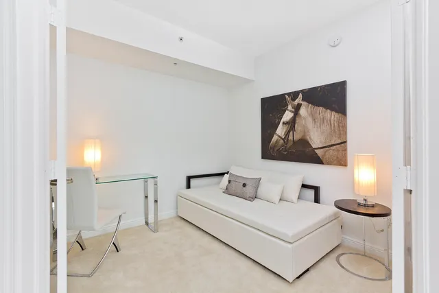 a kitchen with stainless steel appliances granite countertop a refrigerator a sink a stove a microwave and island